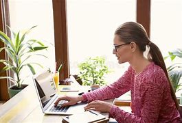 Young freelancer working on a laptop.