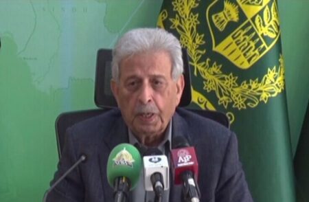 Federal Minister Rana Tanveer Hussain addressing a press conference on sugar supply and pricing in Pakistan.