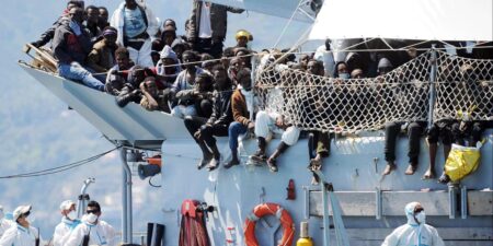 Migrants crossing a dangerous route in harsh conditions, highlighting the risks faced on migration journeys in 2024