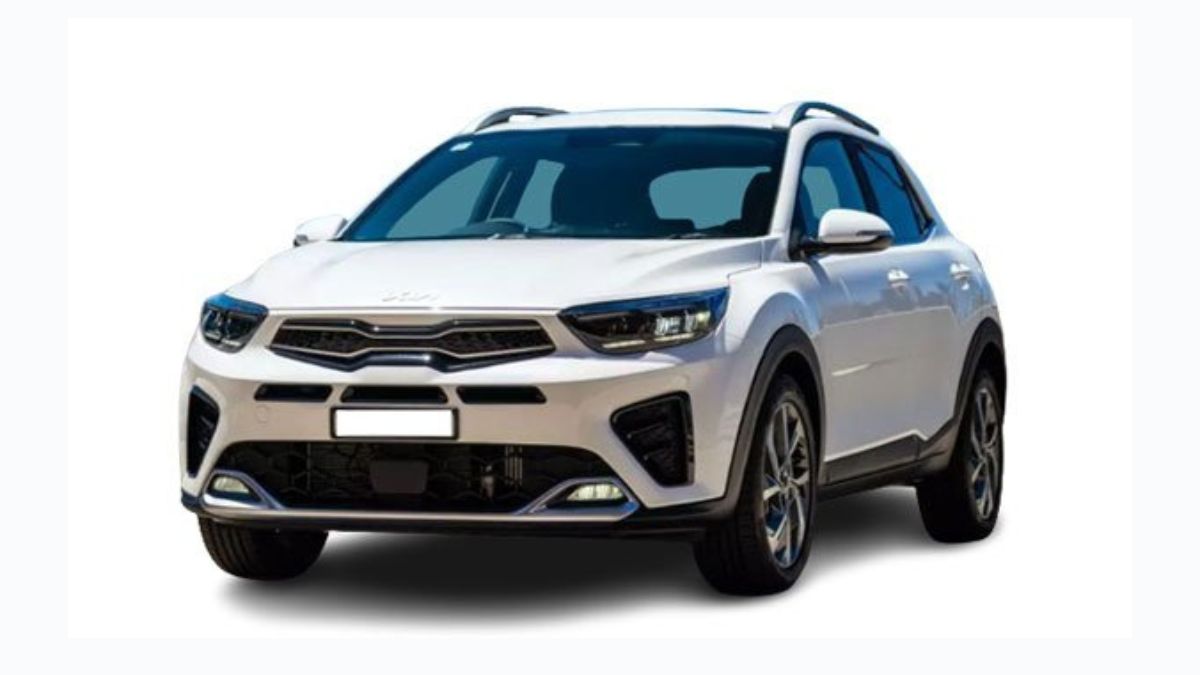 Red 2025 Kia Stonic parked on road in Pakistan