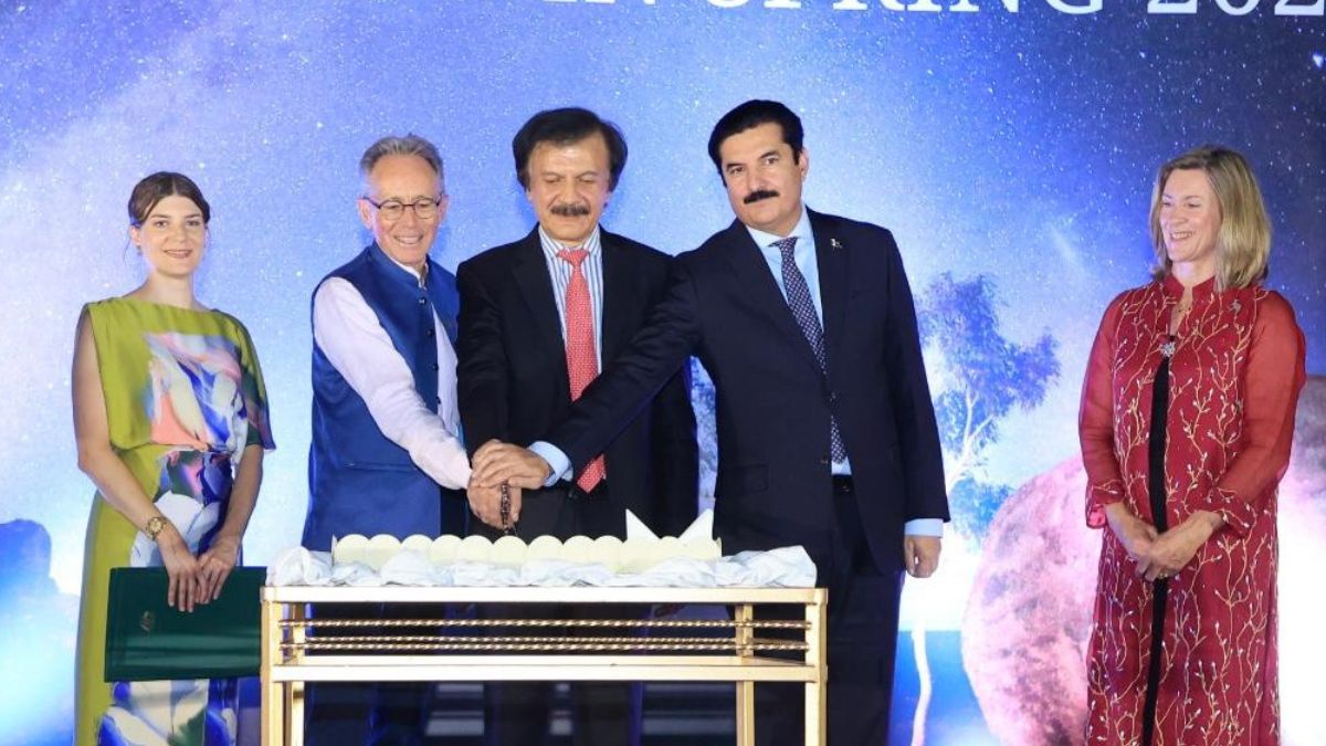 Guests enjoying Australia Day 2025 at Australian High Commission in Islamabad with cultural displays and greenery