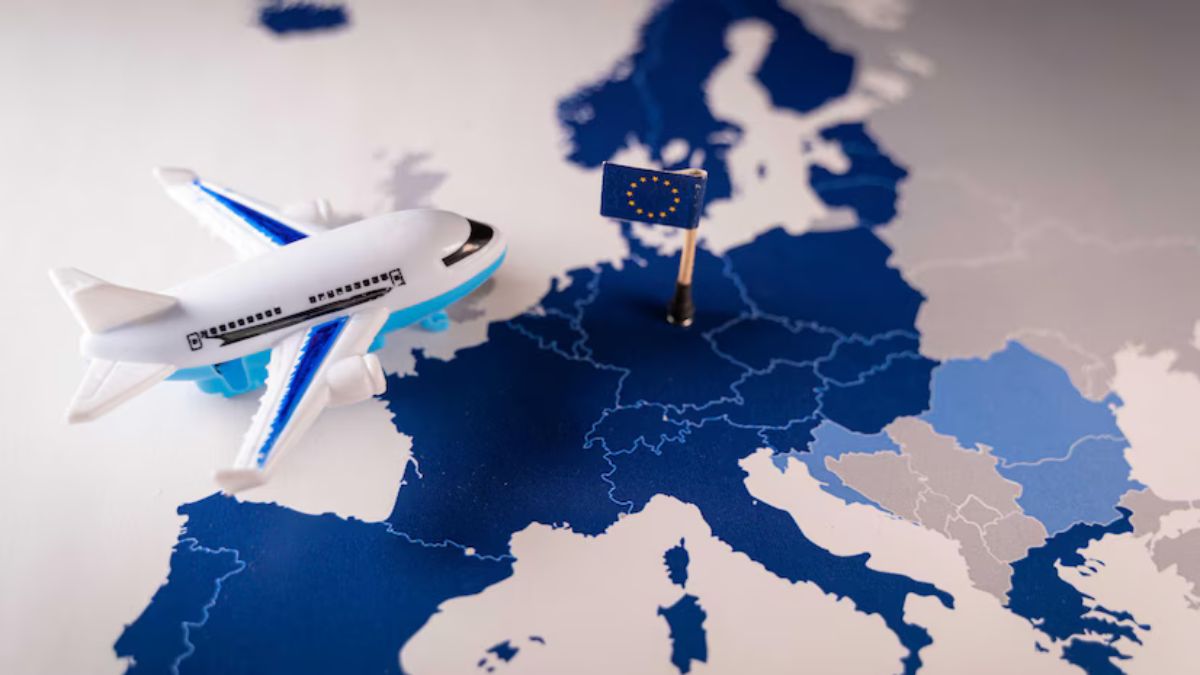 Pakistani traveler holding a passport with the easiest European visa, preparing for Schengen travel in 2025