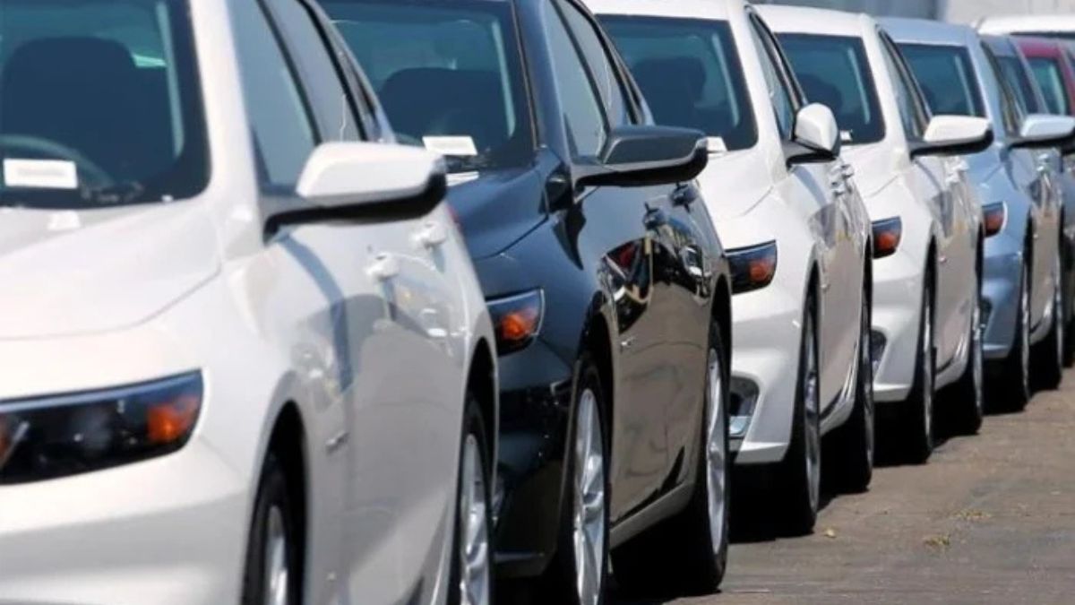 Used cars displayed at a dealership in Pakistan after ban lifted on imports under IMF deal