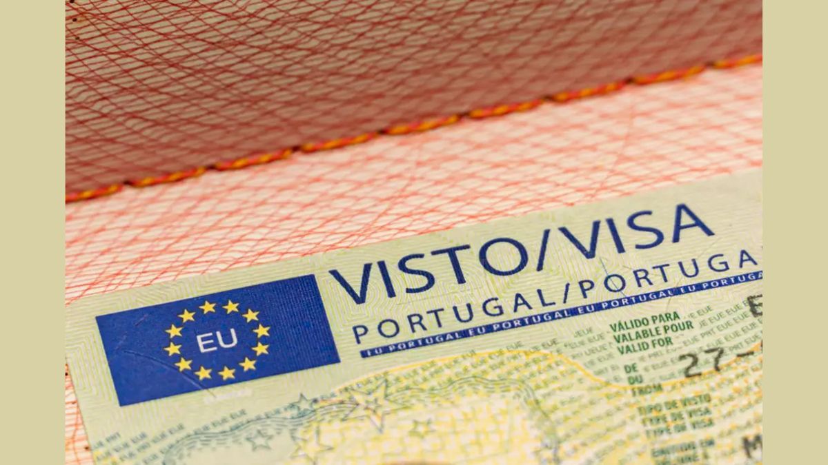 Pakistani professional applying for Portugal work visa with documents and laptop