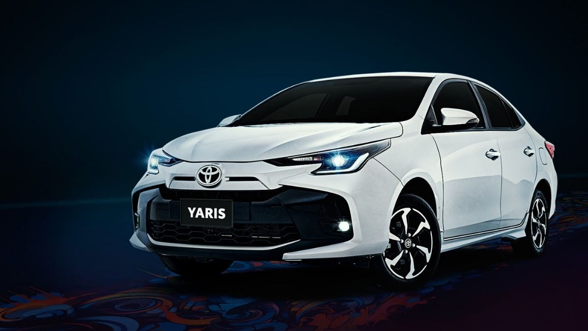 Toyota Yaris 1.3L white sedan parked in Pakistan