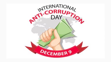 Pakistani youth participating in Anti-Corruption Day march holding banners and raising voices for transparency