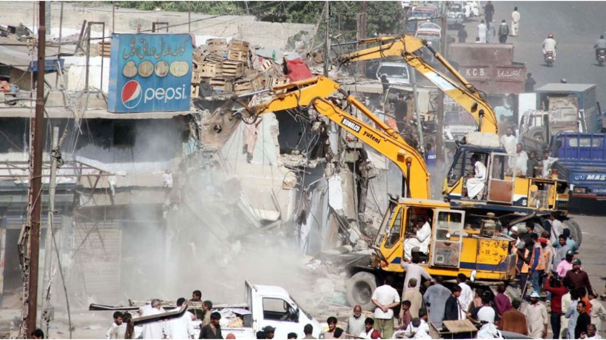 CDA vehicles removing illegal structures in Islamabad Diplomatic Enclave