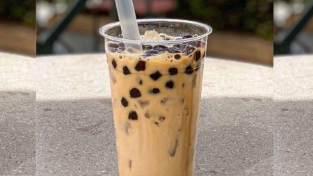 Interior view of a bubble tea café in Karachi with drinks on counter
