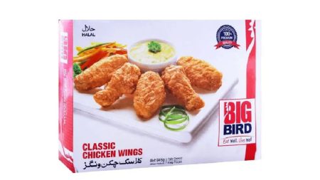 Assorted Big Bird frozen food items including nuggets, kababs, and wings on a wooden table