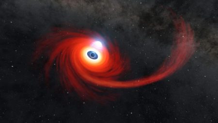 Illustration of a black hole tearing apart a massive star during a tidal disruption event observed by NASA
