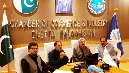 A view of the Chamber of Commerce Quetta building with business professionals networking in Balochistan