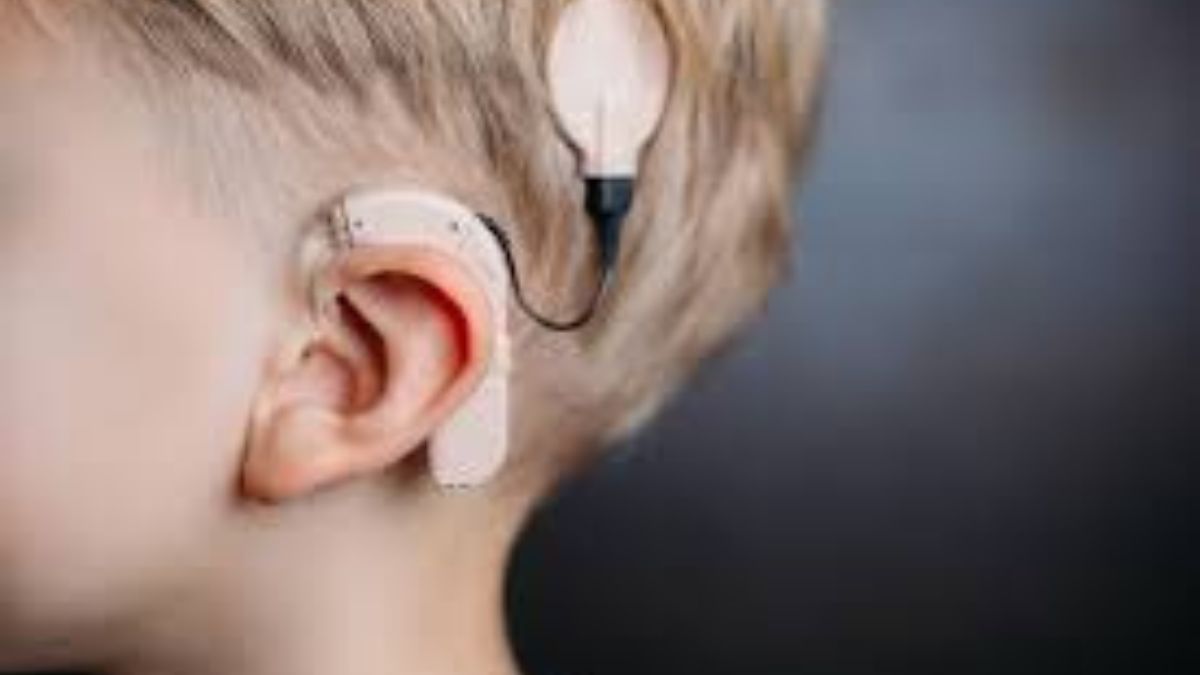 Child receiving cochlear implant surgery in Pakistan hospital
