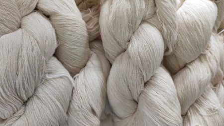 Bales of cotton yarn stacked in a textile warehouse in Pakistan – June 2025 pricing update