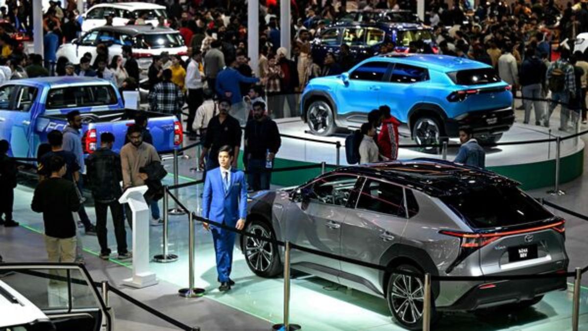 Visitors exploring new cars, bikes, and EVs at Expo Auto Show Pakistan 2025 in Karachi