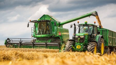 Modern agriculture machinery like tractors and harvesters improving farming productivity in Pakistan