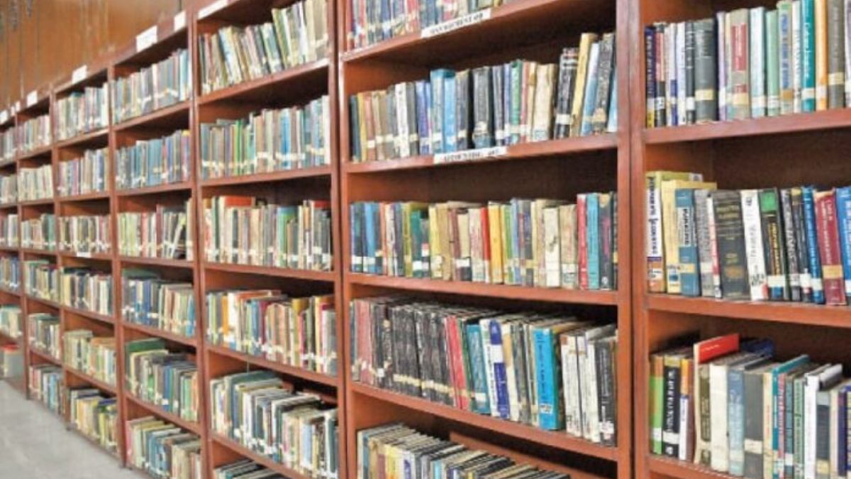 Bookshelves and reading area inside a modern public library in Pakistan