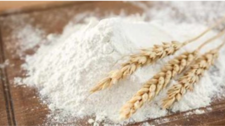 A shopper buying wheat flour (atta) in Pakistan - June 2025 market price update