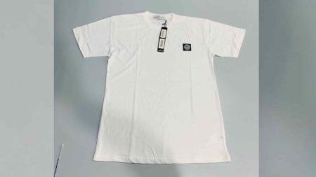 Stacks of leftover T-shirts in a Pakistani garment factory prepared for international export