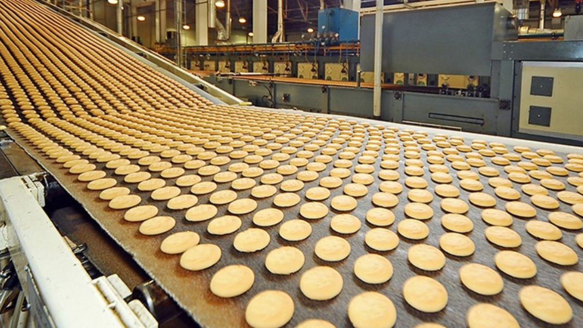 Modern food processing facility in Pakistan with packaged products and production line in 2025