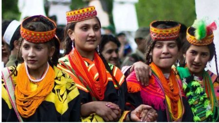 Kalash people celebrating Uchal Festival with traditional dance and rituals in Bumburet Valley, Pakistan