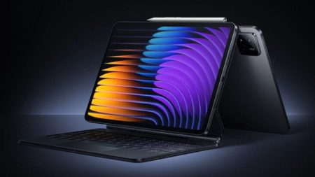 Xiaomi Pad 7S Pro tablet in light grey with 12.5-inch display showing abstract wallpaper, slim bezels, and a rear dual-tone camera module