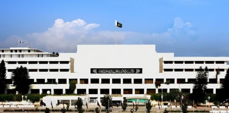 Image showing the Parliament building in Islamabad or a close-up of budget documents with charts, symbolizing legislative approval of national finance.