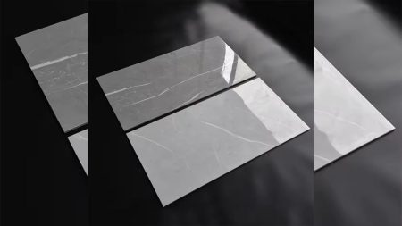 Assortment of Master Tiles in various sizes and finishes, including ceramic and porcelain, displayed in a bright showroom setting in Pakistan, representing options for flooring and walls with a focus on current prices and buying tips.