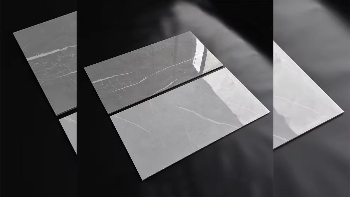 Assortment of Master Tiles in various sizes and finishes, including ceramic and porcelain, displayed in a bright showroom setting in Pakistan, representing options for flooring and walls with a focus on current prices and buying tips.