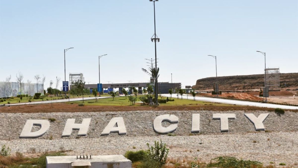 Aerial view of DHA City Karachi housing plots with road network and development