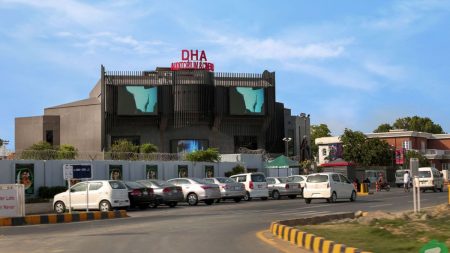 Aerial view of DHA Phase 4 Lahore showing blocks, roads, and green areas in 2025