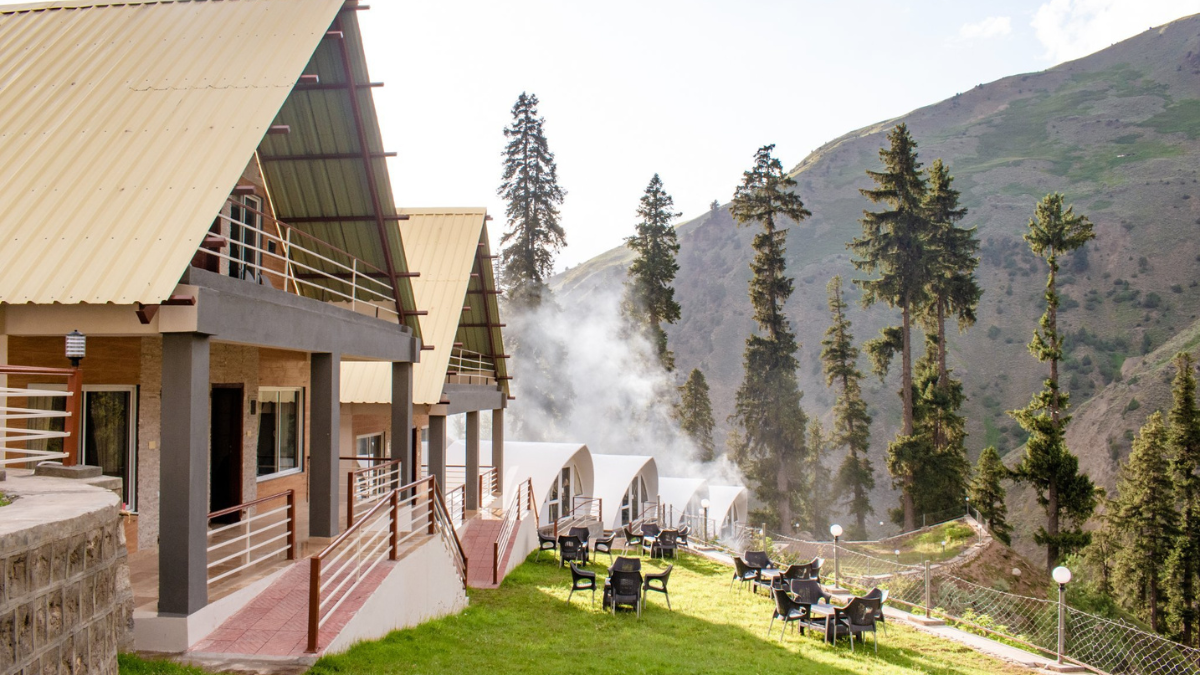 A scenic hotel view in Naran Valley with mountains in the background