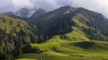 Snow-covered Makra Peak with scenic trekking trail in Pakistan, 2025