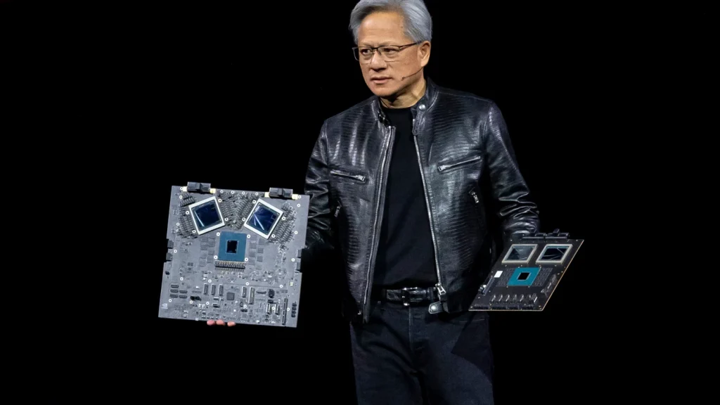 Jensen Huang, co-founder and CEO of Nvidia, displays the new Blackwell GPU chip during the Nvidia GPU Technology Conference in San Jose, California, on March 18, 2024.