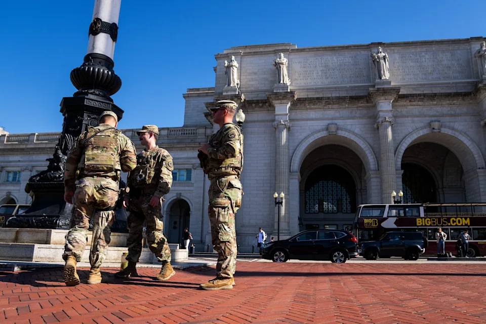 Members of the Louisiana National Guard patrol the perimeter of Union Station in Washington, DC, as President Donald Trump's deployment of National Guard troops and federal takeover of Metro Police Department continues on Tuesday, Aug. 26, 2025.