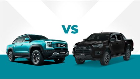 Side-by-side comparison of BYD Shark PHEV and Toyota Hilux Revo 2025 in Pakistan