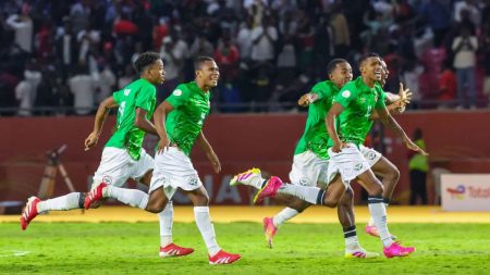 Madagascar and Sudan players in action during CHAN 2024 semi-final clash