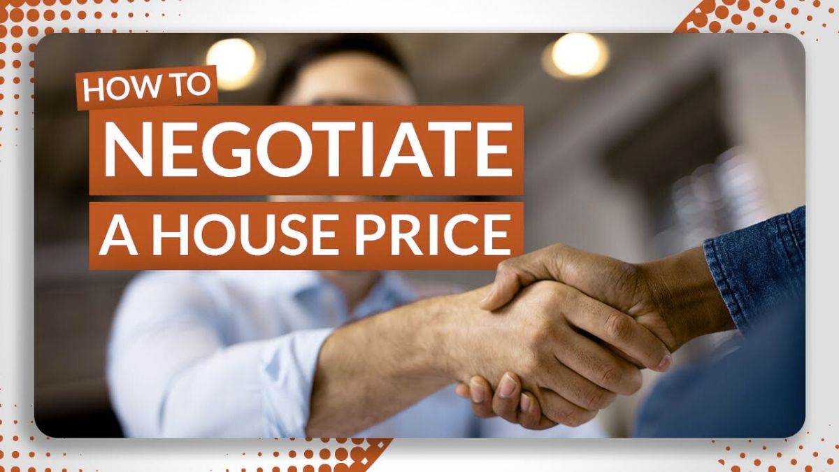 Buyer discussing house price negotiation with real estate agent in front of a home