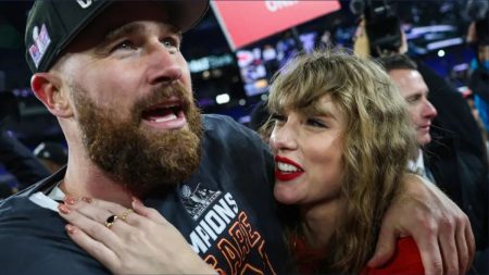 Taylor Swift smiling with Travis Kelce in a romantic moment