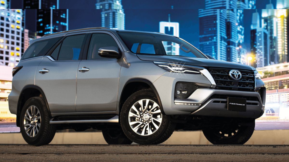 Used Toyota Fortuner SUV parked on city street in Islamabad Pakistan